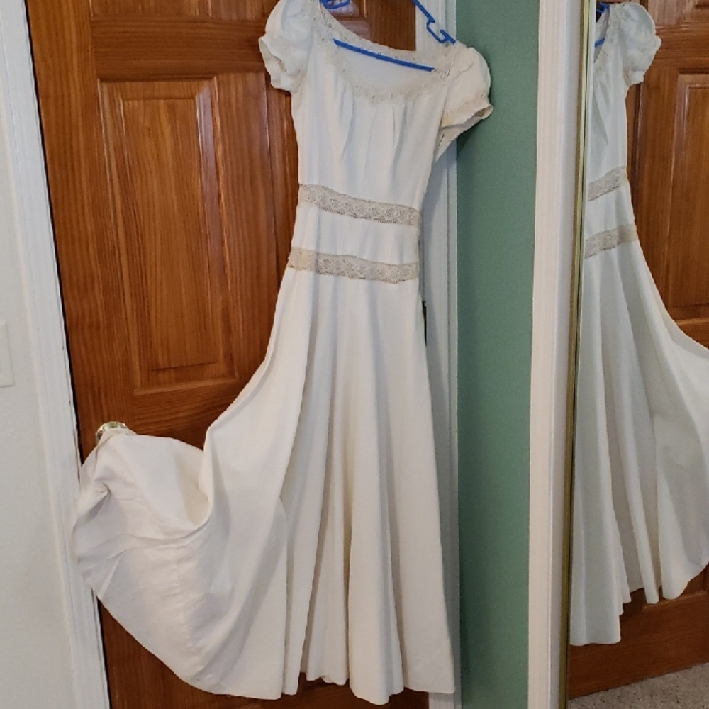 Vintage white a-line dress with puff sleeves and crochet eyelet detailing